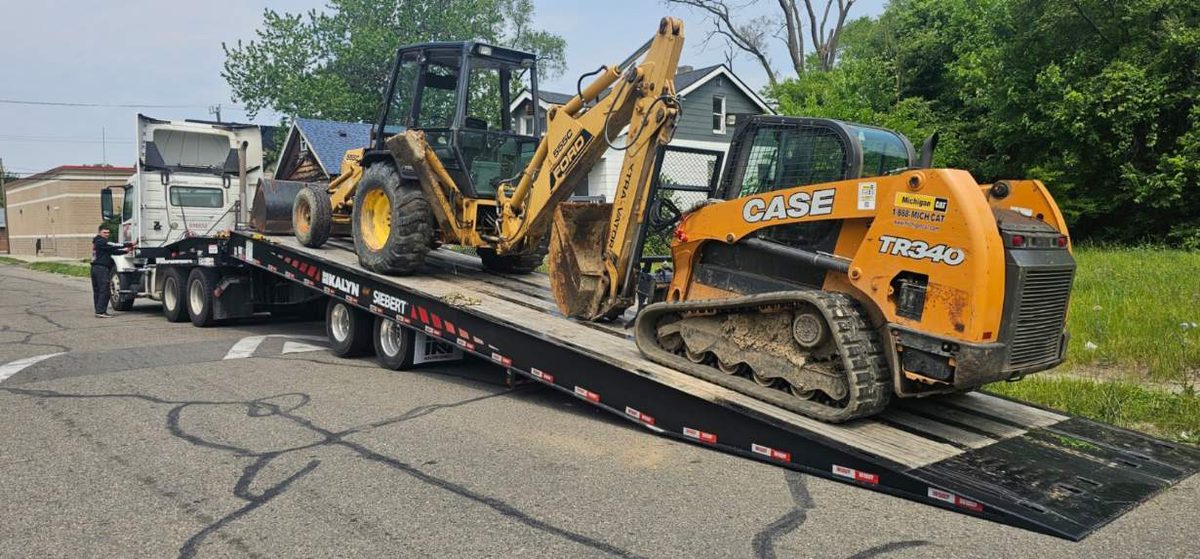 Case TR340 and backhoe loading on trailer
